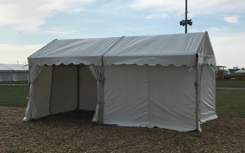 10 X 20 frame tent with walls set at Husker Harvest Days in Grand Island, NE
