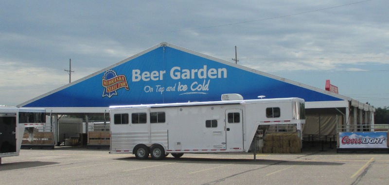 IMAGE of 80 X 75 clear span tent for beer garden with logo on gable end