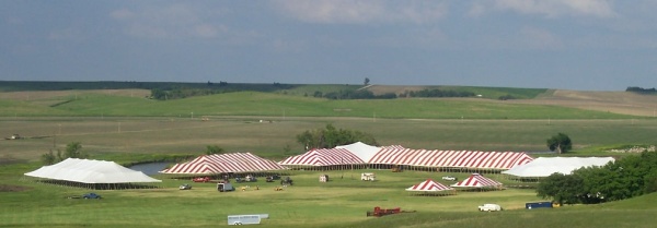 Image of 86 X red and white T tent with other tents