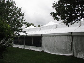 Image of high peak clear span tent with walls closed