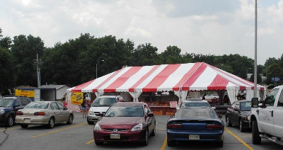 Image of end view of 30 X 60 Red & White unique™ frame tent