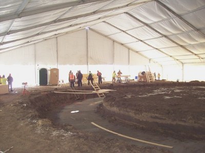 Image of tent used to allow a winter construction job