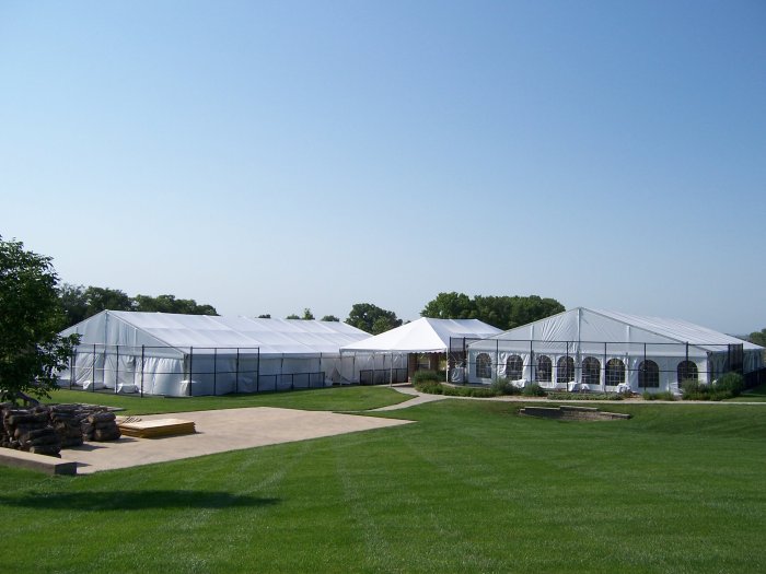 view of Tents set on tennis courts with cathedral walls