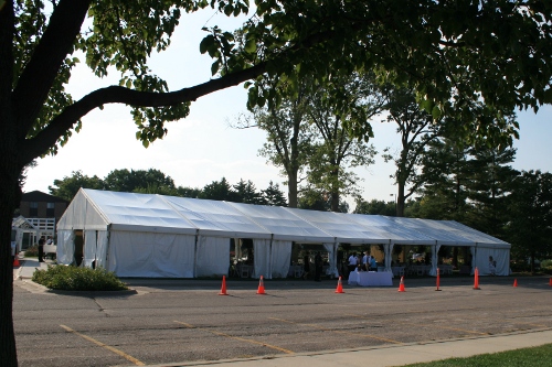 Image of tent from parkinglot side