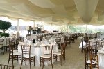 Wedding tent rental Omaha NE with clear walls and decorations