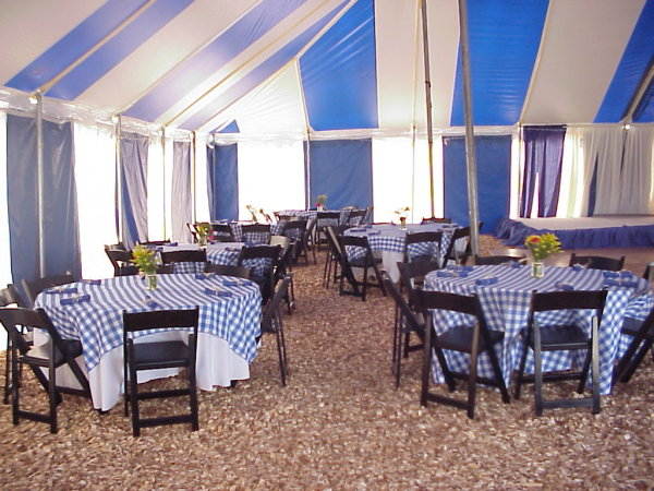 Image of interior of 60 X 60 tent decorated for a country style reception 