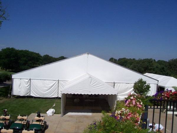 Image of large event tent at Ironwood country club with an entry tent