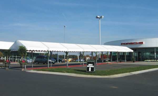 IMAGE of white entryway awning set for auto showroom
