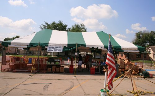 image of 20 X 40 green and white tent rental for small fireworks stand