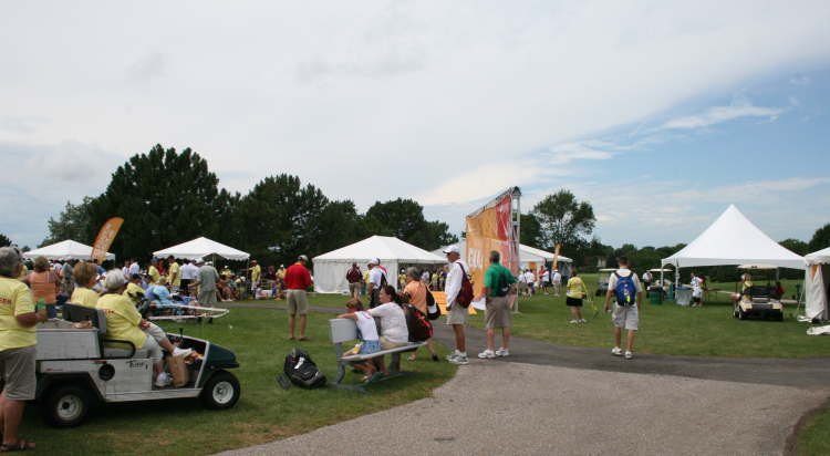 IMAGE of group of tents at golf tournament