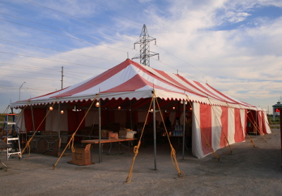 image of 30 X 70 red and white tent with walls on 3 sides