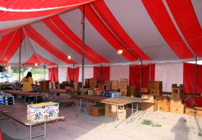 image of 30 X 70 red and white tent as a fireworks stand