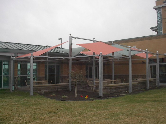 Image of shade structure over hospital outdoor eating area.