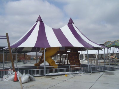 Image of double peak shade structure, to provide shade cover for the playgoround area.