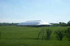 giant 86 X 215 white tent rental in a field