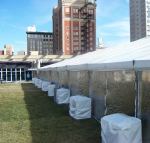 Kansas City huge tent with doubled stacked weights along side of tent