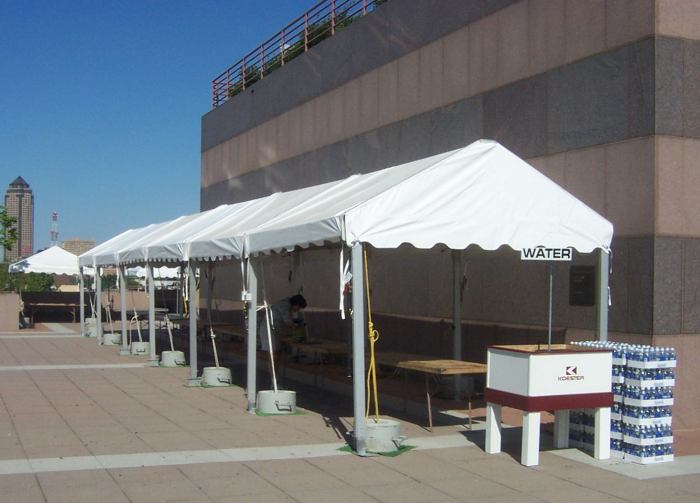 image of Des Moines tent rental anchored with uncovered small weights